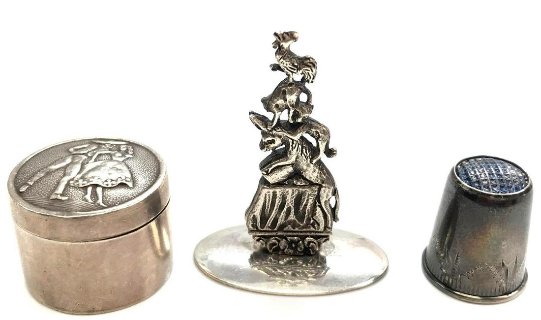 Sterling Silver Lot : Quilting Thimble, Pill Box and: Sterling Silver Lot : Quilting Thimble, Pill Box and "Town Musicians" Figure. Hallmarked sterling silver (size 8) thimble; 1 x 3/4 inch pill box; and 1-3/4 x 1-1/2 inch sterling silver "town musicians