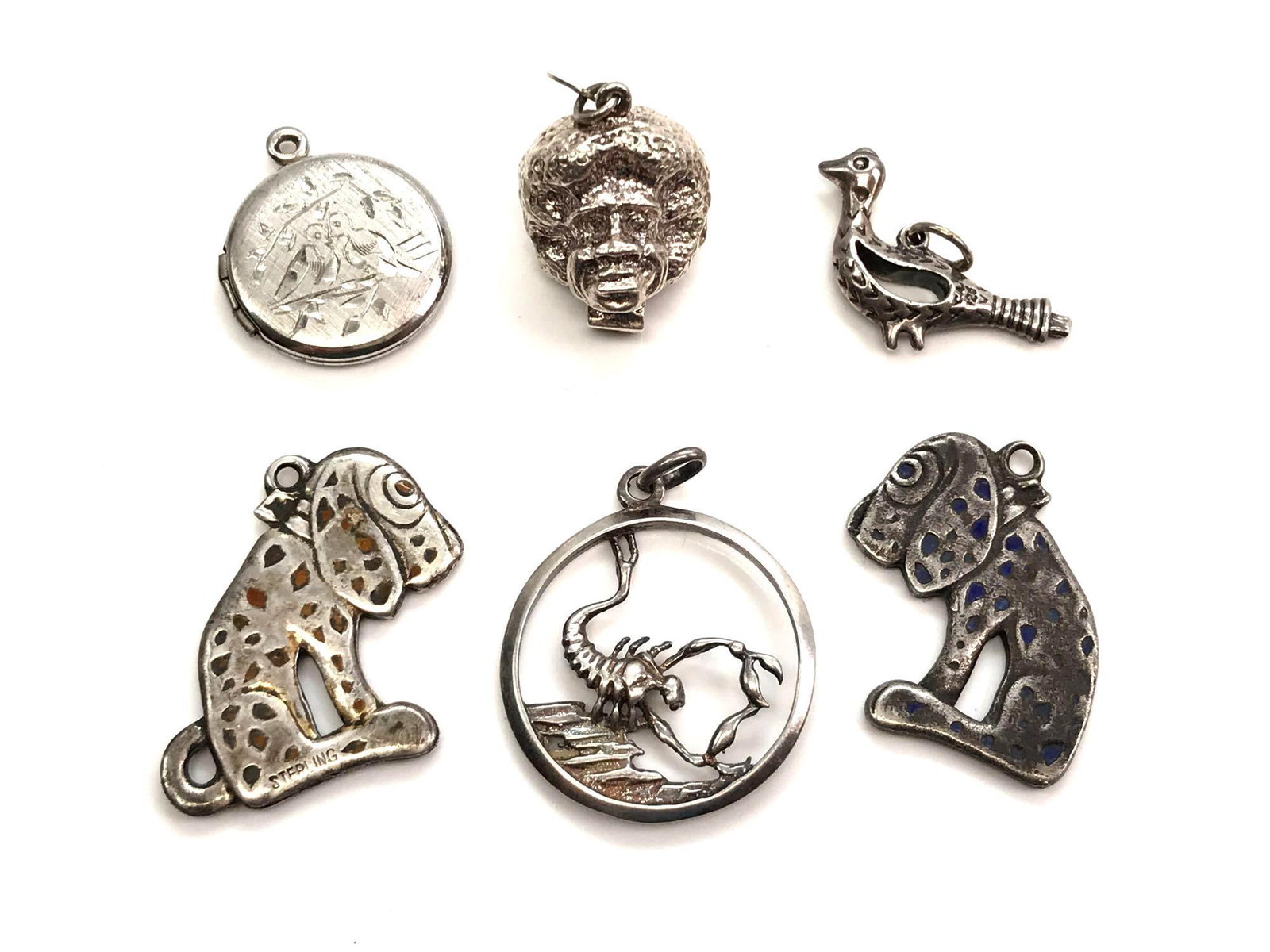 Collection of 6: Sterling Silver Charms - Pups,: Largest sterling silver Scorpio charm measures 1 x 1 inch; delicate sterling silver lovebird locket measures 3/4 x 3/4 inch; 50.4g