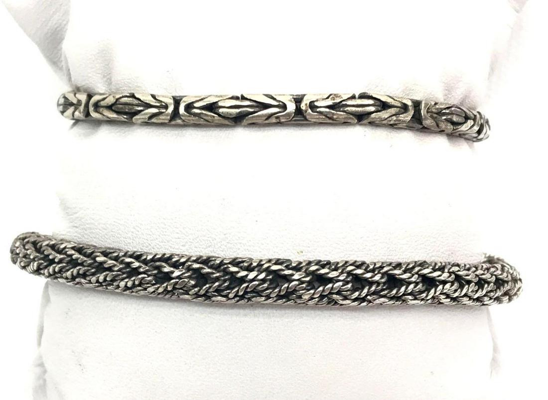 Lot of 2: Vintage Sterling Silver Woven Link Bracelets: The longer sterling silver woven link bracelet measures 8 inches and secures with a toggle clasp; the shorter 7 inch sterling silver bracelet secures with a single hook clasp. 42.3g
