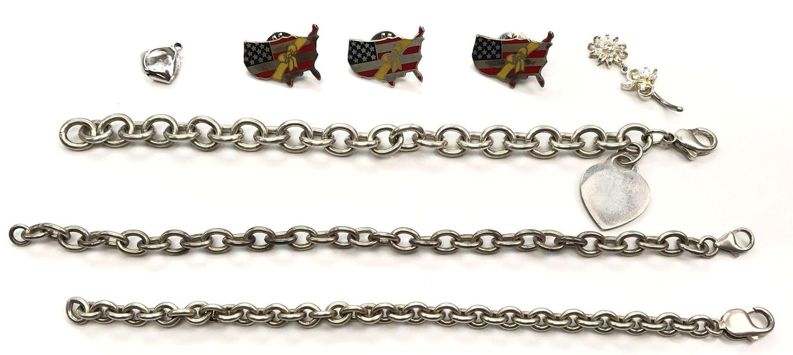 Sterling Silver Lot : 3 Chain Bracelets and 3 U.S.: Lot includes three sterling silver curb link bracelets each secures with a lobster clasp and three sterling silver U.S. lapel pinbacks, and more; 91.2g