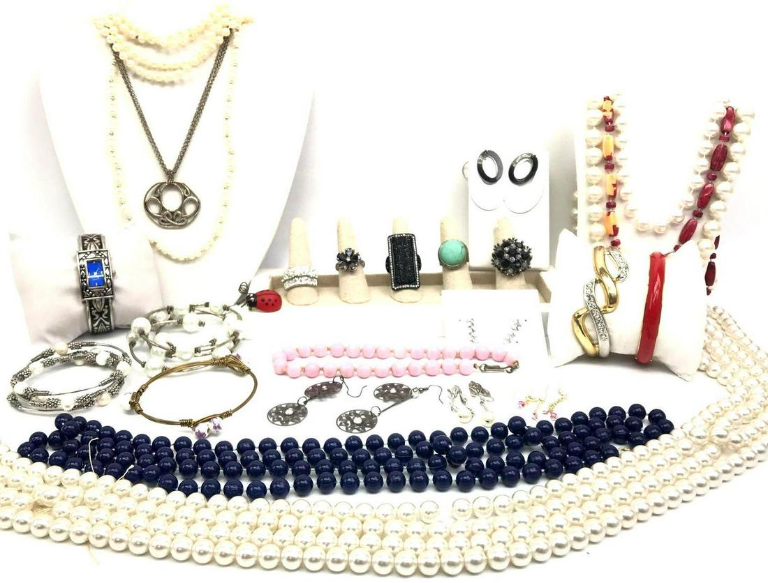 Complete Vintage Costume Jewelry Collection: A handsome collection of classic costume jewelry pieces includes rings, iridescent pearl strands,chunky beaded necklaces, smooth stylish bracelets, bangles, pierced earrings and more