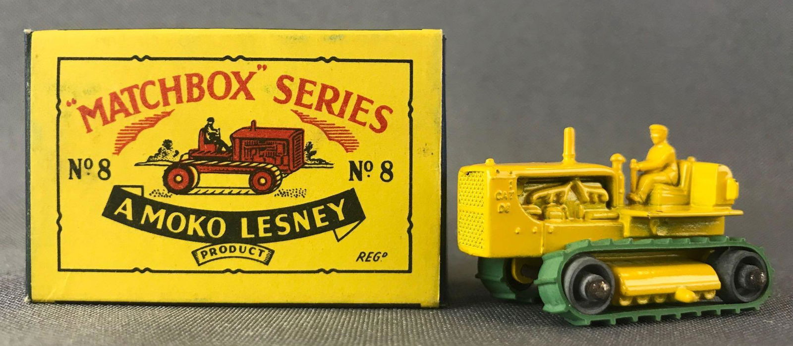 Matchbox No. 8 Caterpillar Tractor Die-Cast Vehicle: Yellow body, green tracks, a Moko Lesney Product. Made in England, B Box