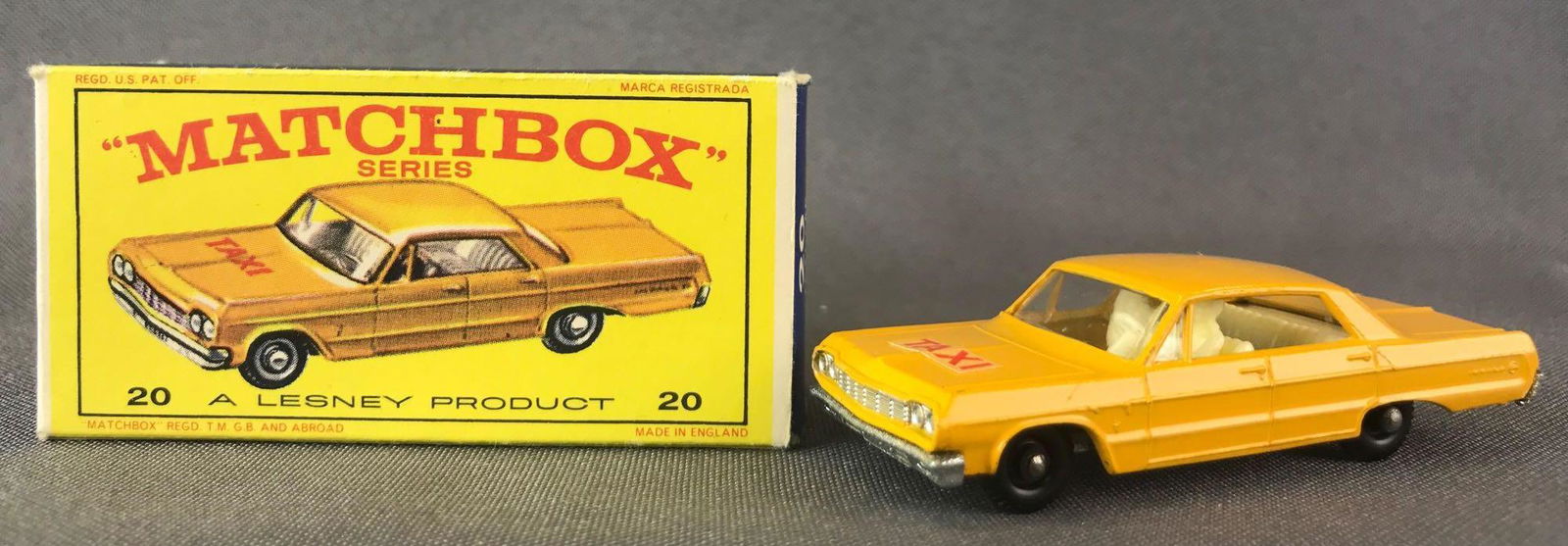 Matchbox No. 20 Chevrolet Impala Taxi Die-Cast Vehicle: Yellow body, BPW, Taxi decal. A Lesney Product. Made in England, E Box