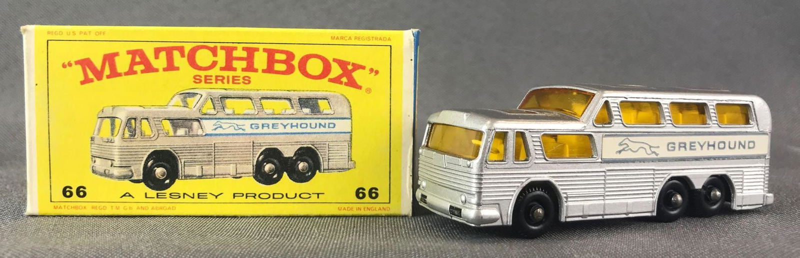 Matchbox No. 66 Greyhound Coach Die-Cast Vehicle with: Silver body, amber windows, BPW, Greyhound decals. A Lesney Product. Made in England, E Box