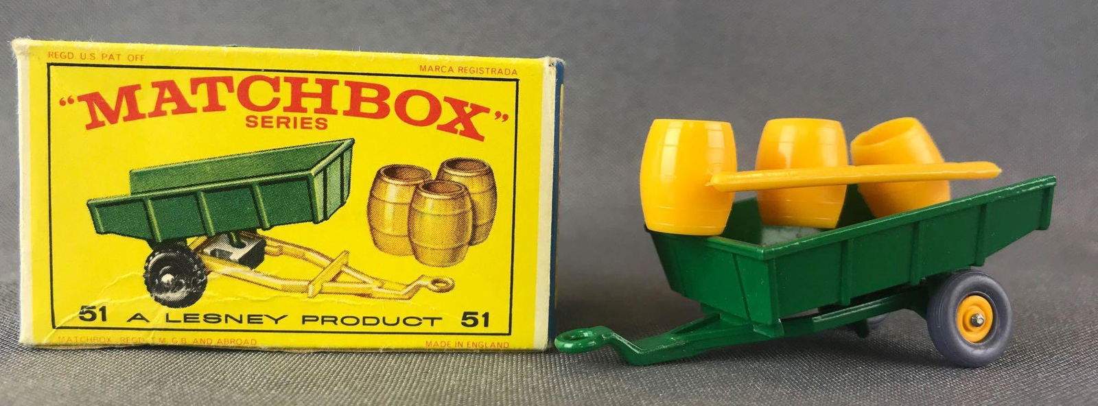 Matchbox No. 51 Tipping Trailer Die-Cast Vehicle with: Green body, GPW, barrel accessories. A Lesney Product. Made in England, E Box