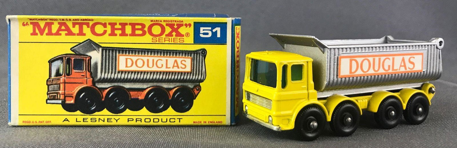 Matchbox No. 51 8-Wheel Tipper Die-Cast Vehicle with: Yellow body, blue windows, BPW, white/orange Douglas decal. A Lesney Product. Made in England, F Box