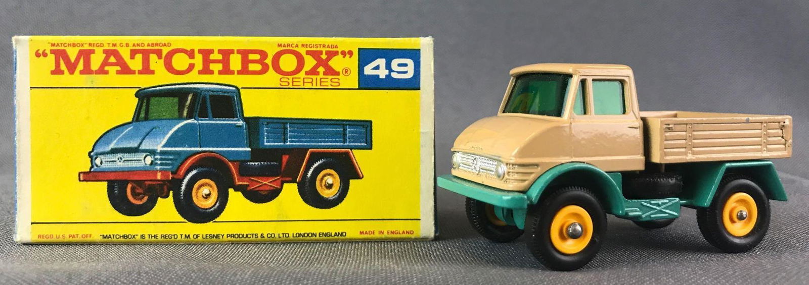 Matchbox No. 49 Unimog Die-Cast Vehicle with Original: Tan body, turquoise base, green windows, BPW. A Lesney Product. Made in England, F Box
