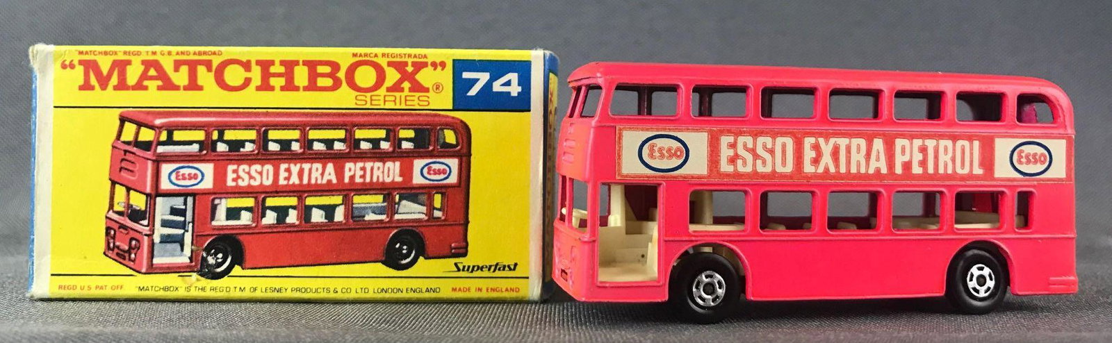 Matchbox Superfast No. 74 Daimler Bus Die-Cast Vehicle: Fluorescent pink body, red base, BPW, Esso Extra Petrol decals. A Lesney Product. Made in England, F Superfast Box