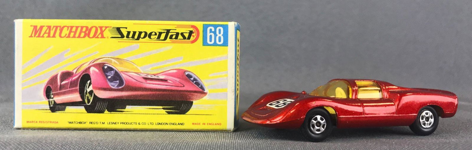 Matchbox Superfast No. 68 Porsche 910 Die-Cast Vehicle: Orange body, amber windows, BPW, white/black 68 decal. A Lesney Product. Made in England, G Box