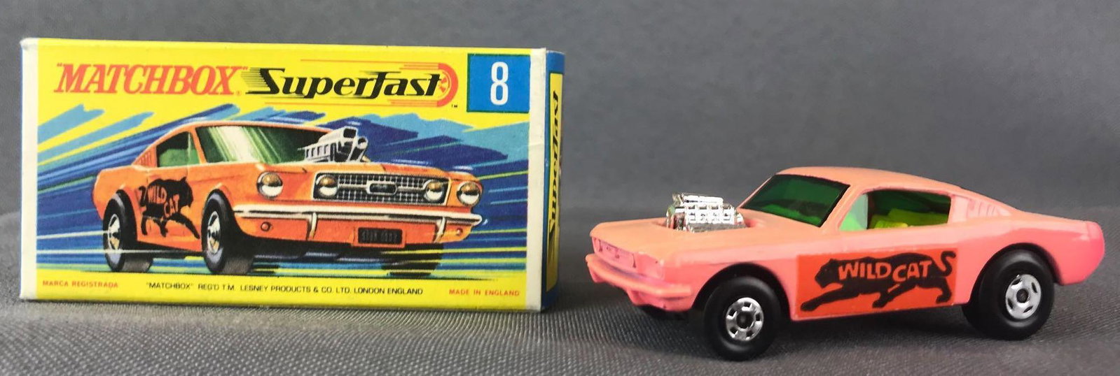Matchbox Superfast No. 8 Wild Cat Dragster with: pink body, green windows, BPW, Wild Cat decals. A Lesney Product. Made in England, G Box