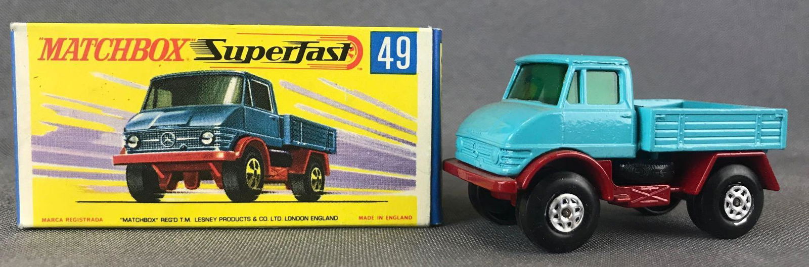 Matchbox Superfast No. 49 Unimog Die-Cast Vehicle with: Turquoise body, red base, green windows, BPW. A Lesney Product. Made in England, G Box