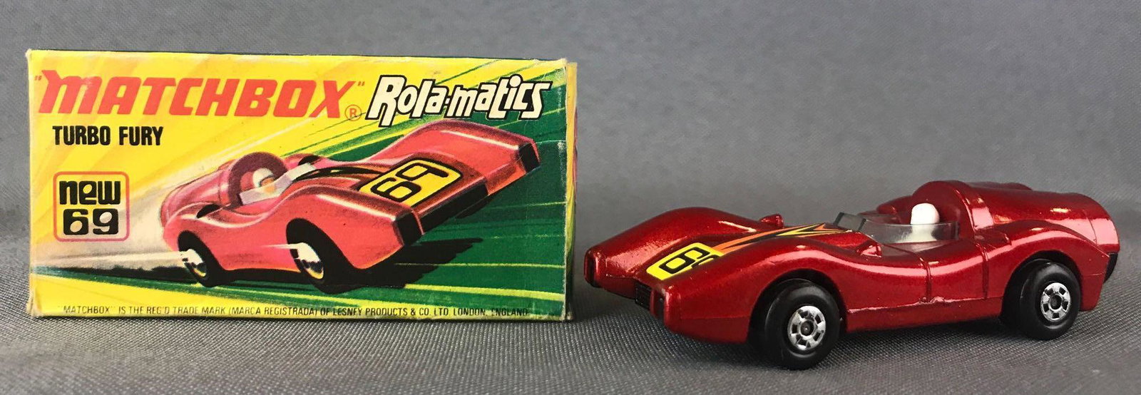 Matchbox Rola-matics Superfast No. 69 Turbo Fury: With Original Box. Red body, BPW, yellow/orange/black 69 decal. A Lesney Product. Made in England, I Box