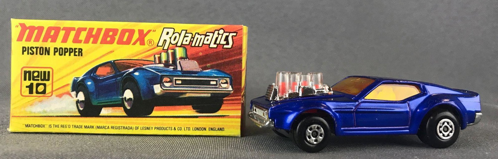 Matchbox Rola-matics Superfast No. 10 Piston Popper: With Original Box. Blue body, amber windows, BPW. A Lesney Product. Made in England, I Box