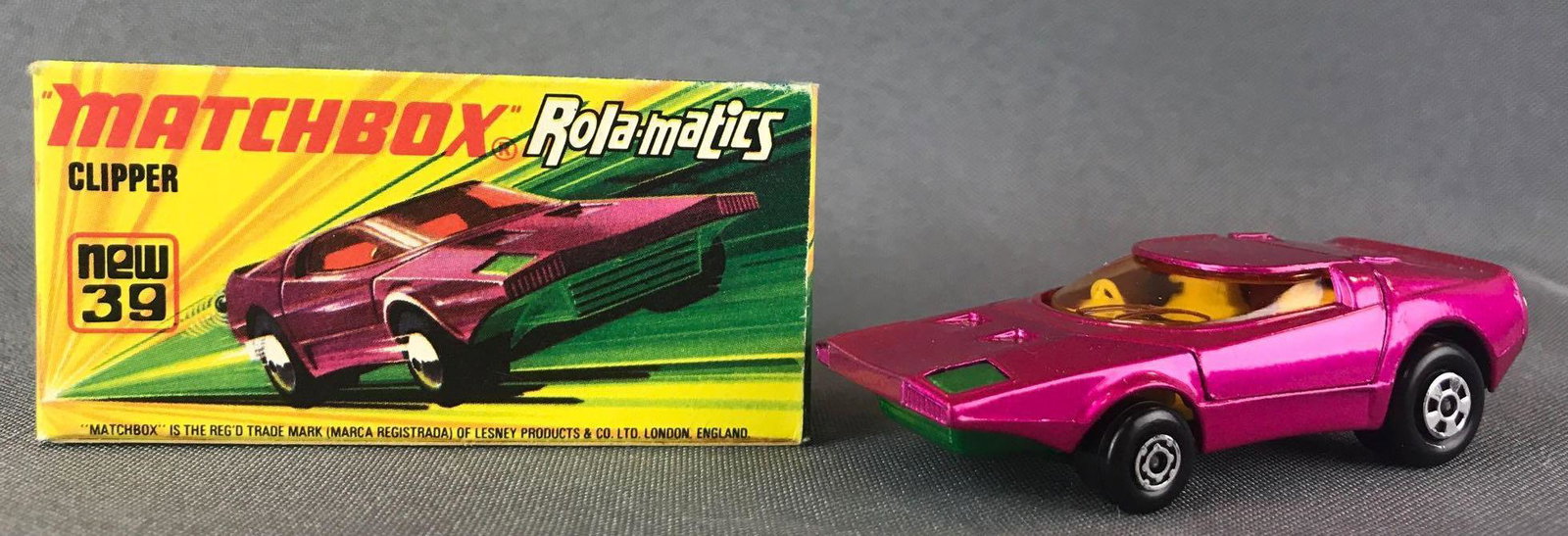 Matchbox Rola-matics Superfast No. 39 Clipper Die-Cast: With Original Box. Fuschia body, green base, amber windows, BPW. A Lesney Product. Made in England, I Box