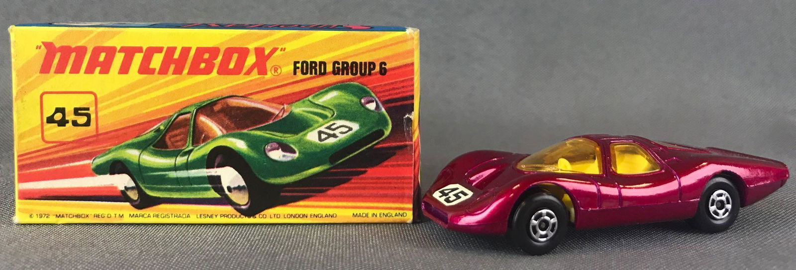 Matchbox Superfast No. 45 Ford Group 6 Die-Cast Vehicle: Fuschia body, amber windows, BPW, white/black 45 decal. A Lesney Product. Made in England, I Box