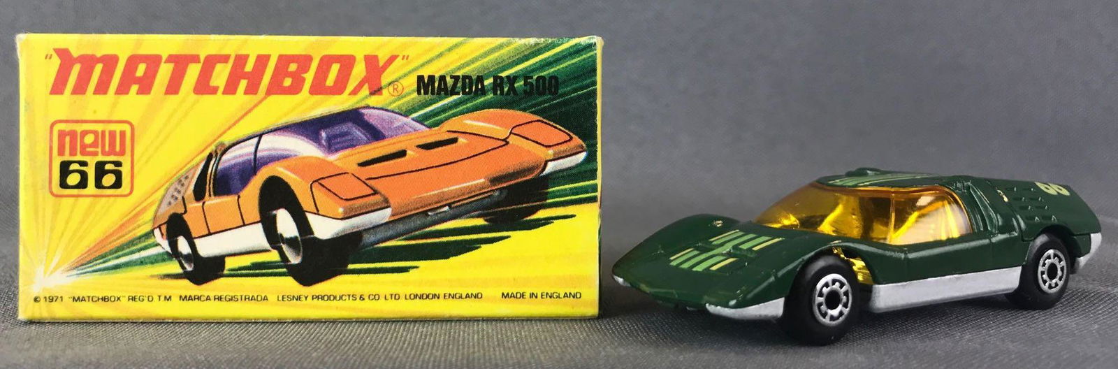 Matchbox Superfast No. 66 Mazda RX 500 Die-Cast Vehicle: Green body, amber windows, BPW, green/yellow stripes/66 decals. A Lesney Product, I Box