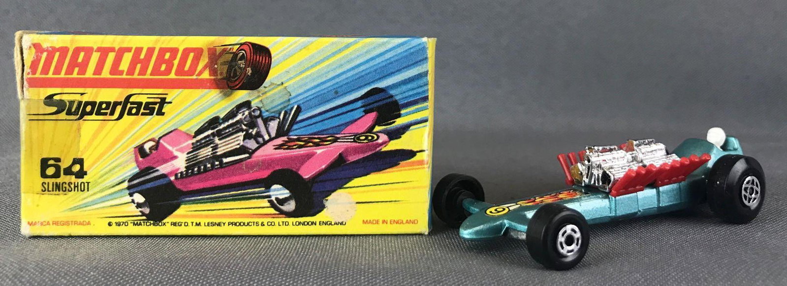 Matchbox Superfast No. 64 Slingshot Dragster Die-Cast: Blue body, BPW, flames/9 decal. Some box damage. A Lesney Product. Made in England, H Box