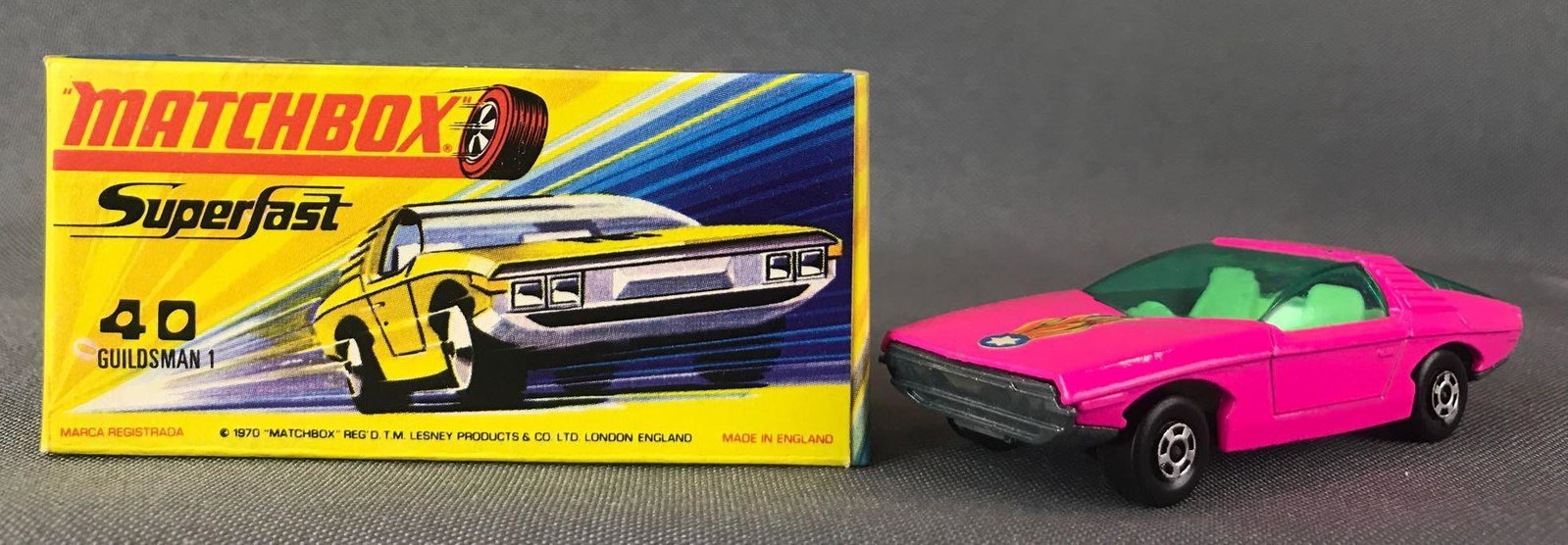Matchbox Superfast No. 40 Vauxhall Guildsman 1 Die-Cast: Fluorescent Pink body, blue/green windows, BPW, Star/flames decal. A Lesney Product. Made in England, H Box