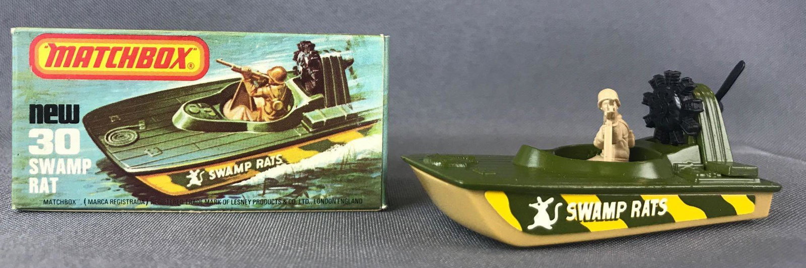 Matchbox Superfast No. 30 Swamp Rat Die-Cast Vehicle: Green body, tan base, BPW, yellow/green/white Swamp Rats decals. A Lesney Product.Ê, L Box