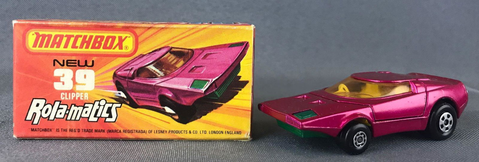 Matchbox Rola-matics Superfast No. 39 Clipper Die-Cast: Fuschia body, green base, amber windows, BPW. A Lesney Product.ÊJ Box