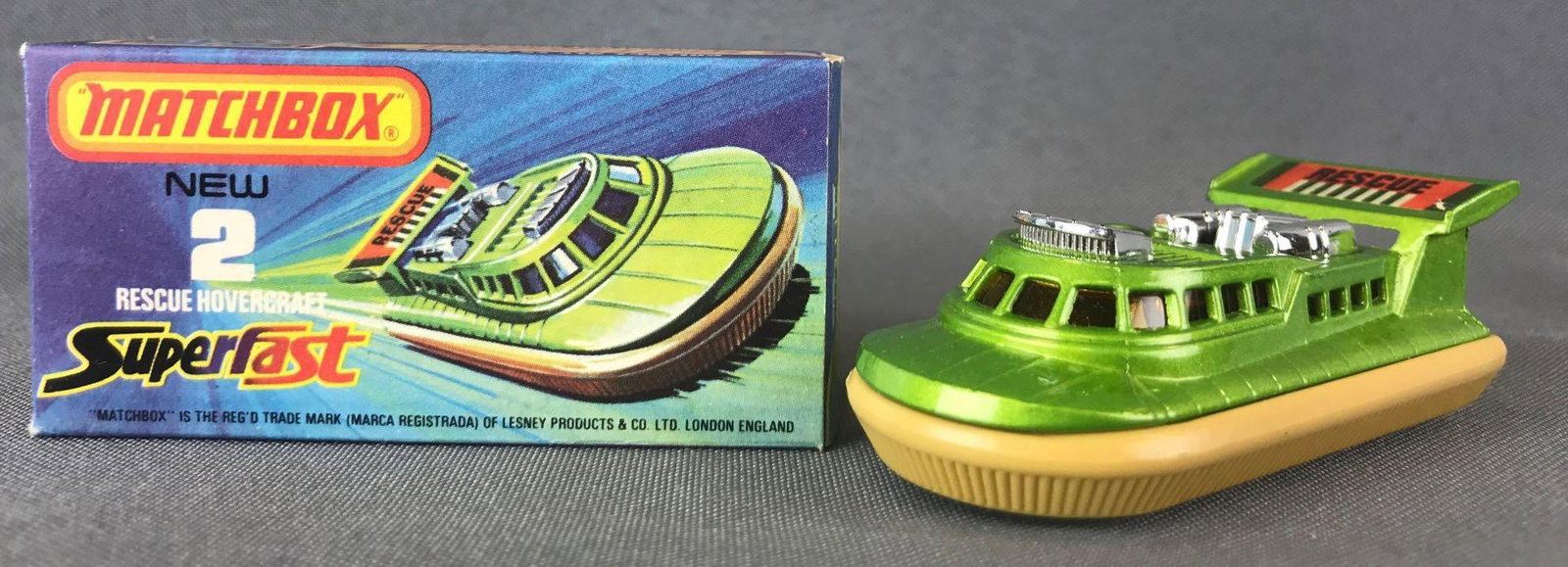 Matchbox Superfast No. 2 Rescue Hovercraft Die-Cast: Green body, tan base, BPW, green/orange Rescue decal. A Lesney Product.ÊJ Box