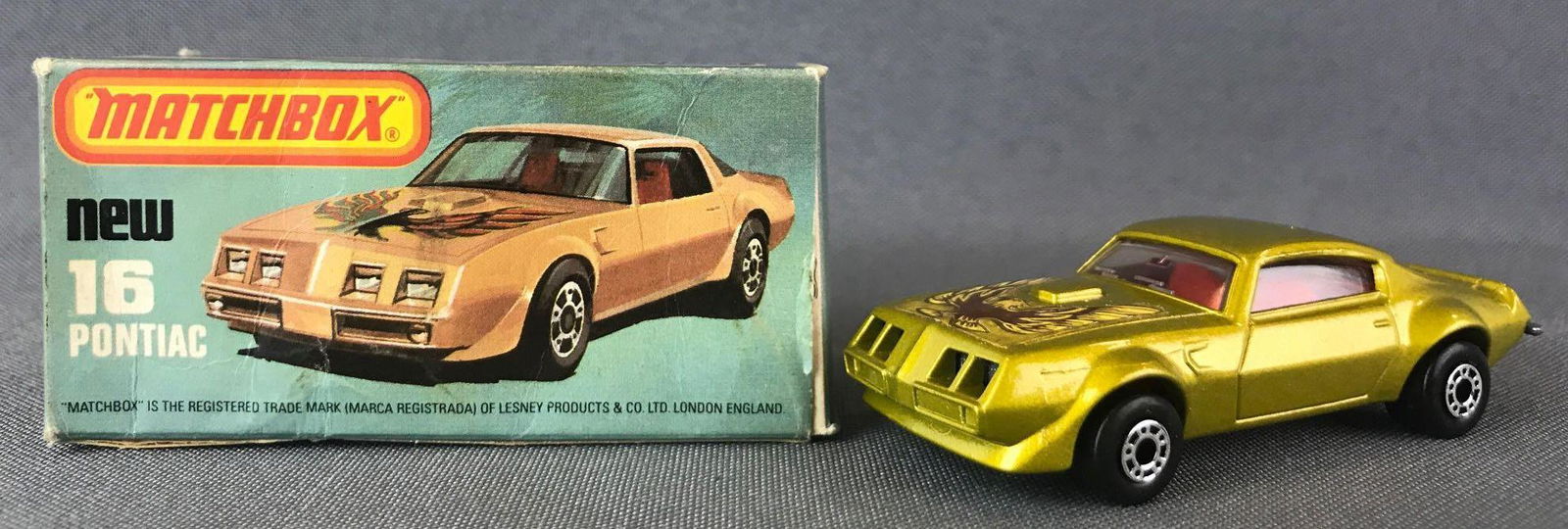 Matchbox Superfast No. 16 Pontiac Die-Cast Vehicle with: Gold body, BPW, brown/yellow Firebird decal. A Lesney Product., L Box
