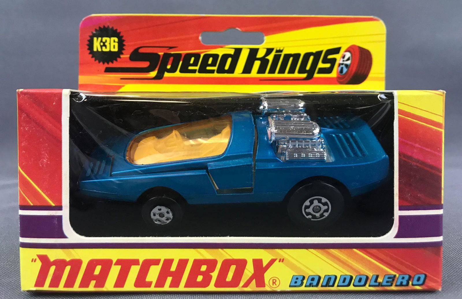 Matchbox Speed Kings No. K-36 Bandolero Die-Cast: Blue body, amber window, BPW. A Lesney Product. Made in England