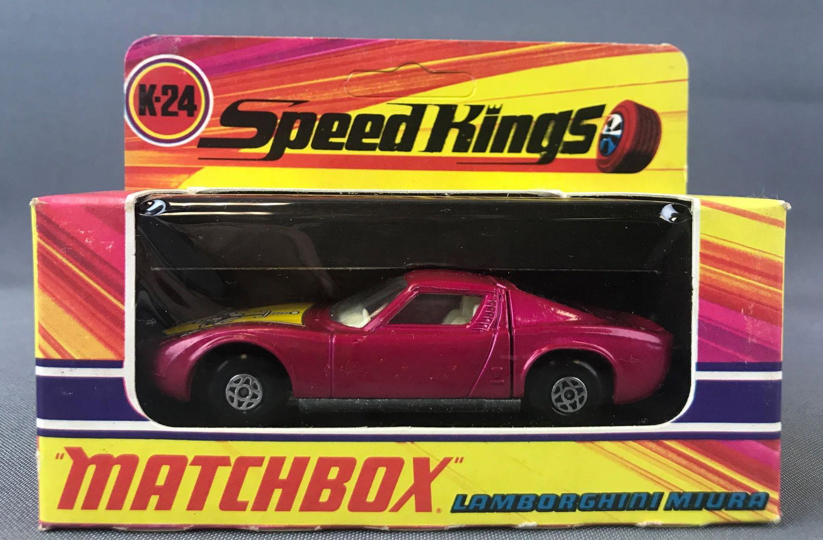 Matchbox Speed Kings No. K-24 Lamborghini Miura: Fuschia body, BPW, yellow/black/white buffalo/sword decal. A Lesney Product. Made in England