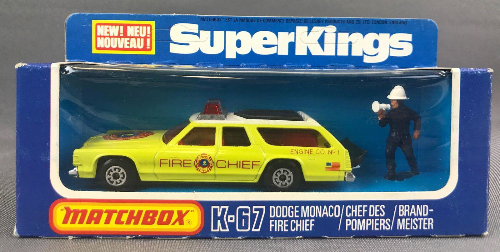 Matchbox Super KongÕs No. K-67 Dodge Monaco Fire Chief: Yellow body, amber windows, BPW. Fire Chief, Shield, Flag, Engine Co. No. 1 decals, figure. A Lesney Product. Made in England