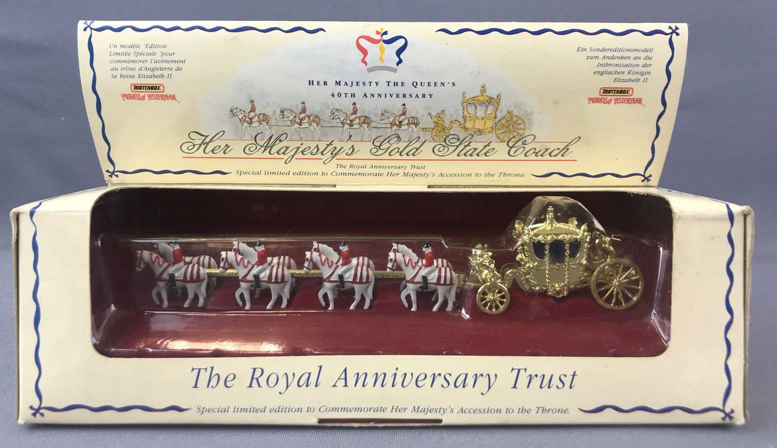 Matchbox Models of Yesteryear No. YY66 Her Majestys: Die-Cast Vehicle in Original Packaging. Gold body, blue windows. A Lesney Product. Made in England