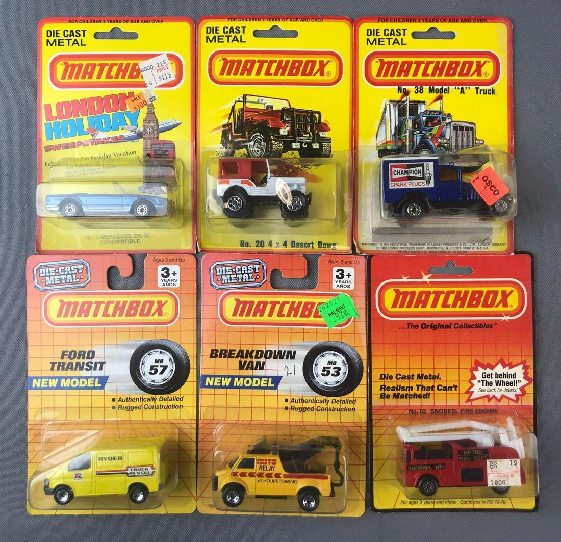 Group of 6 Matchbox Die-Cast Vehicles in Original: Includes No. 6 Mercedes 350 SL Convertible, No. 20 4x4 Desert Dawg, No. 38 Model A Truck, and more.