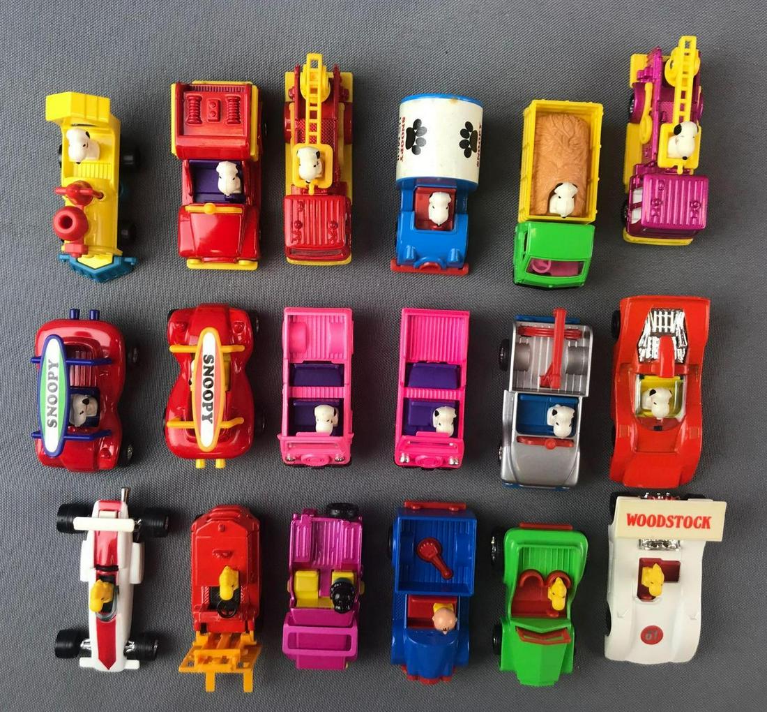 Group of 18 Assorted Peanuts Die-Cast Vehicles: Die-Cast metal with plastic. Snoopy, Woodstock, Charlie Brown, Lucy.