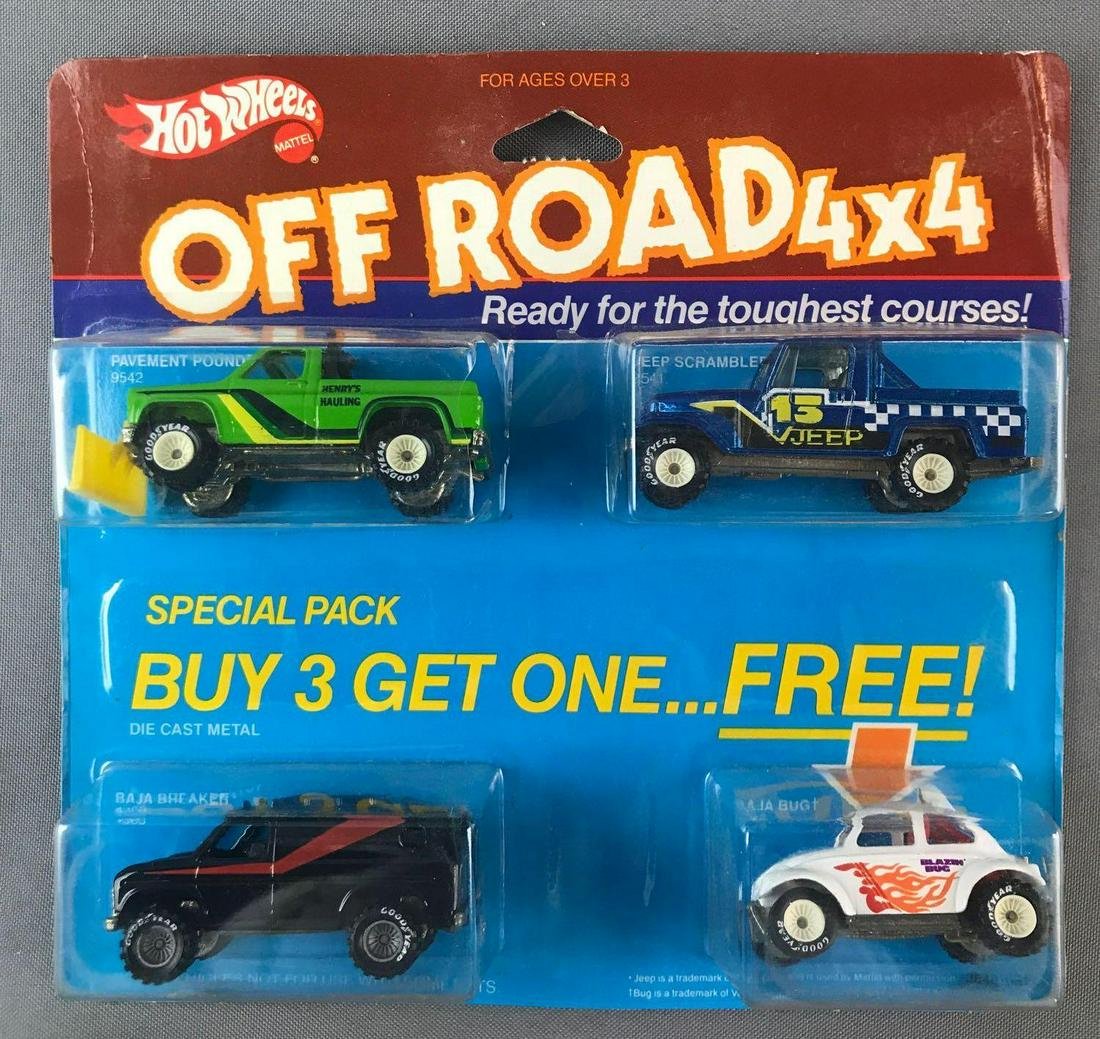 Hot Wheels Off Road 4x4 4-pack Die-Cast Vehicles in: Includes No. 9542 Pavement Pounder, 2541 Jeep Strangler, 4360 Baja Breaker, and 2542 Baja Bug