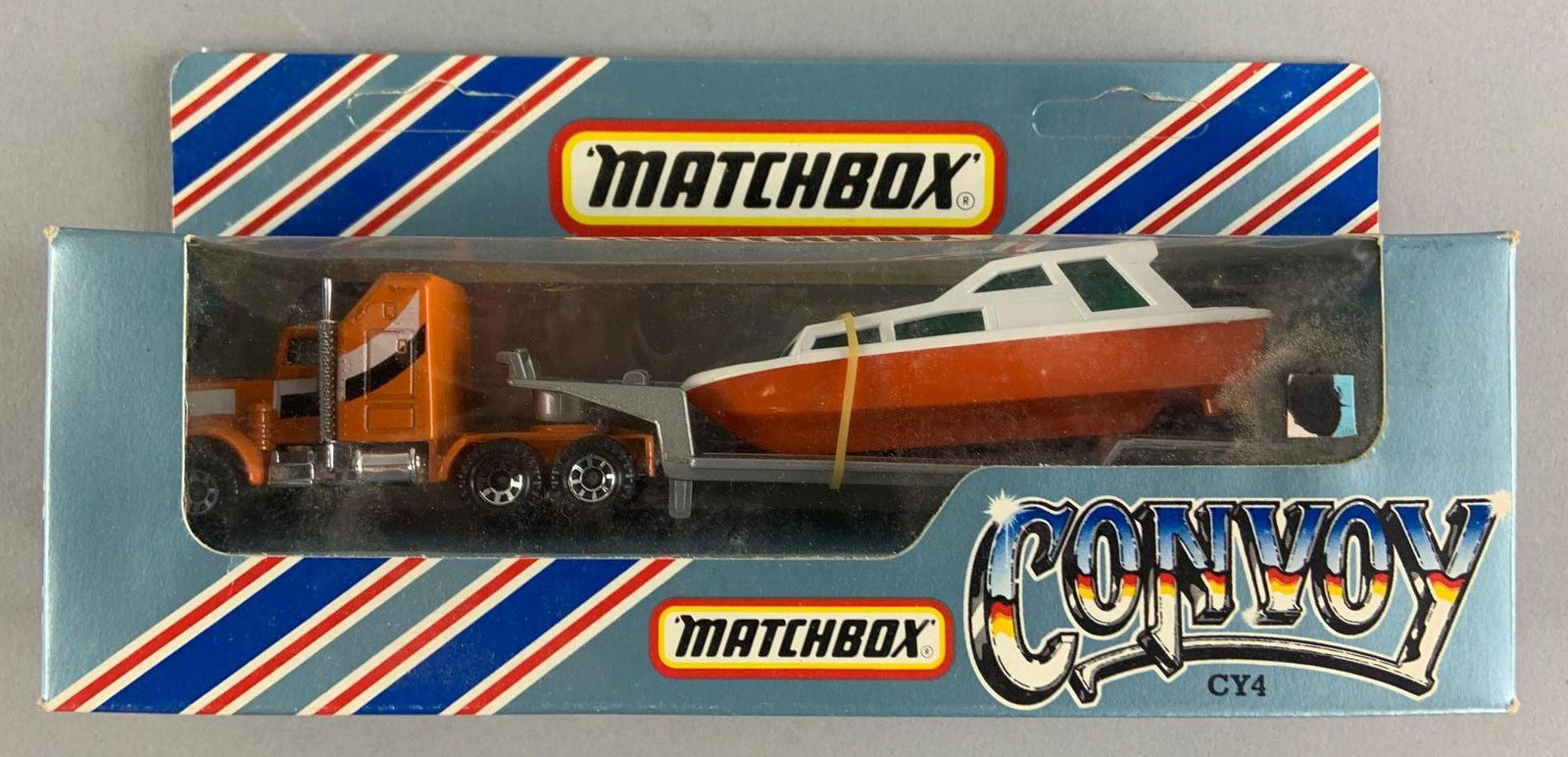 Matchbox convoy CY4 diecast vehicle in original: Semi truck with boat, 1982 matchbox