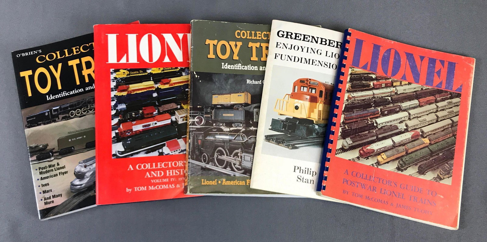 Group of 5 Collector Guide Books: Toy train collectible guide books Used condition