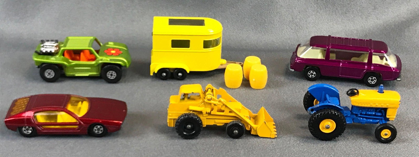 Group of 6 Matchbox Diecast Vehicles: Used, Includes No. 13,20,22,24,43,39. Ford Tractor wheels fall on and off easily Pony Trailer with 4 Barrels And opening back door Weatherhill Hydraulic Tractor Freeman Iner-City Commuter Lamborghini 