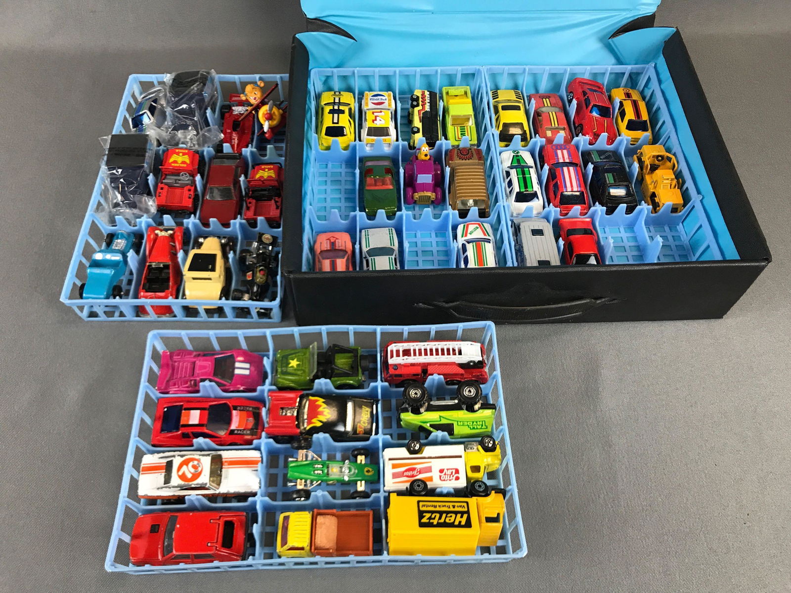 Group of 44 Diecast Vehicles with case: Used 1983 Matchbox Carry Case 48 car Matchbox majorette hot wheels and more