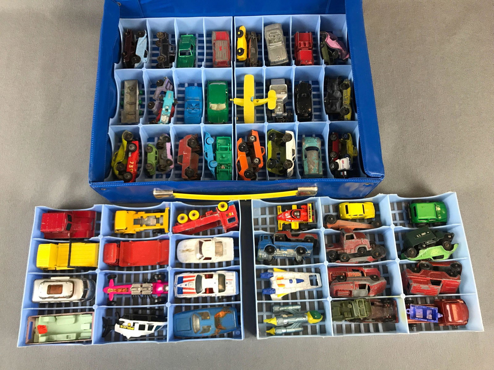 Group of 60 Diecast Vehicles with Case: Used 60 cars midge toy husky matchbox Tootsie toy buck Rogers hot wheels with 48 car case some missing parts