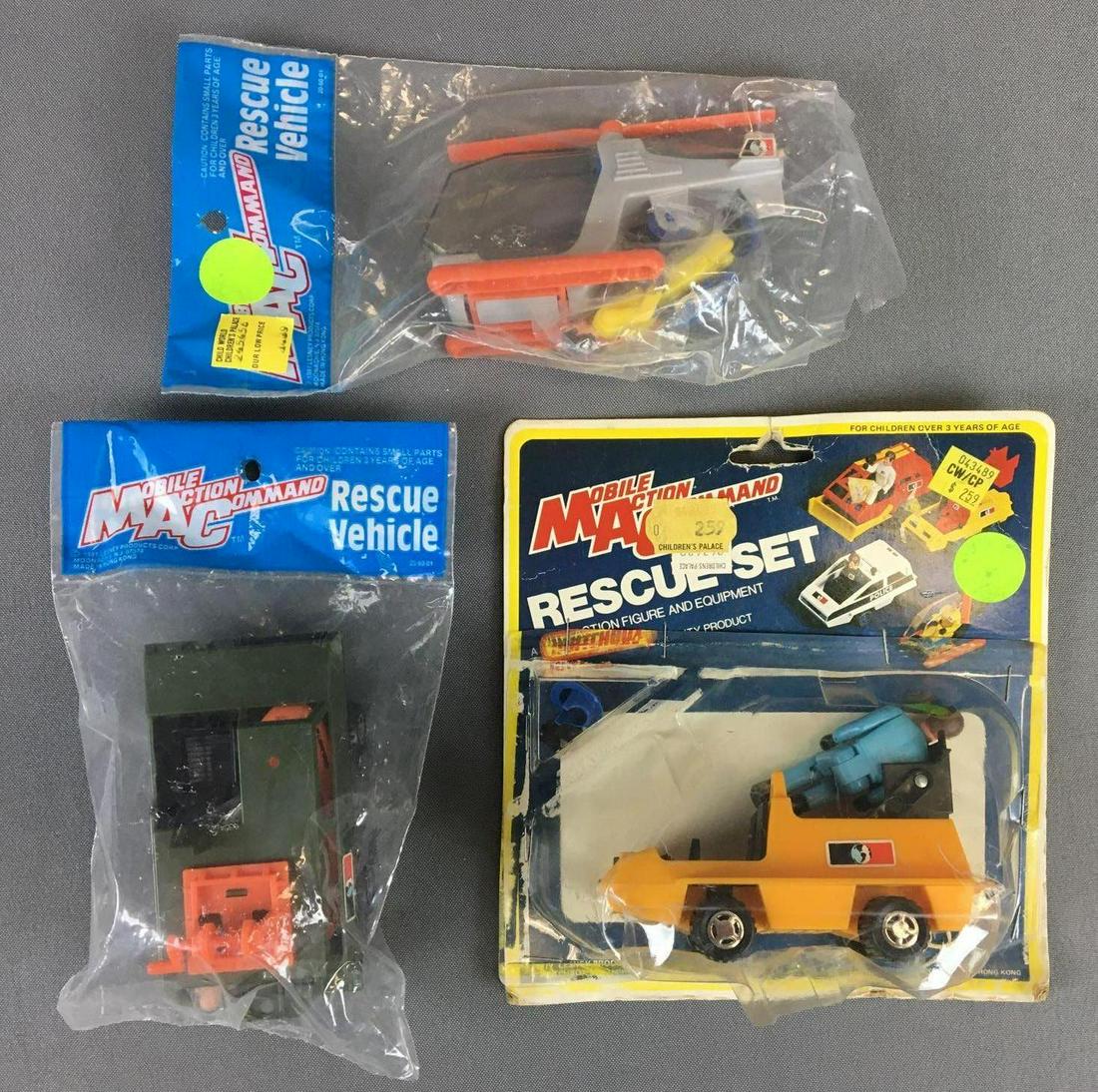 Group of 3 Mobile Action Command Rescue Vehicles: Original packaging, Mobile Action Command, package with card is stapled closed, numbers 04,06,07. Made by Lesney/MatchboxÊ