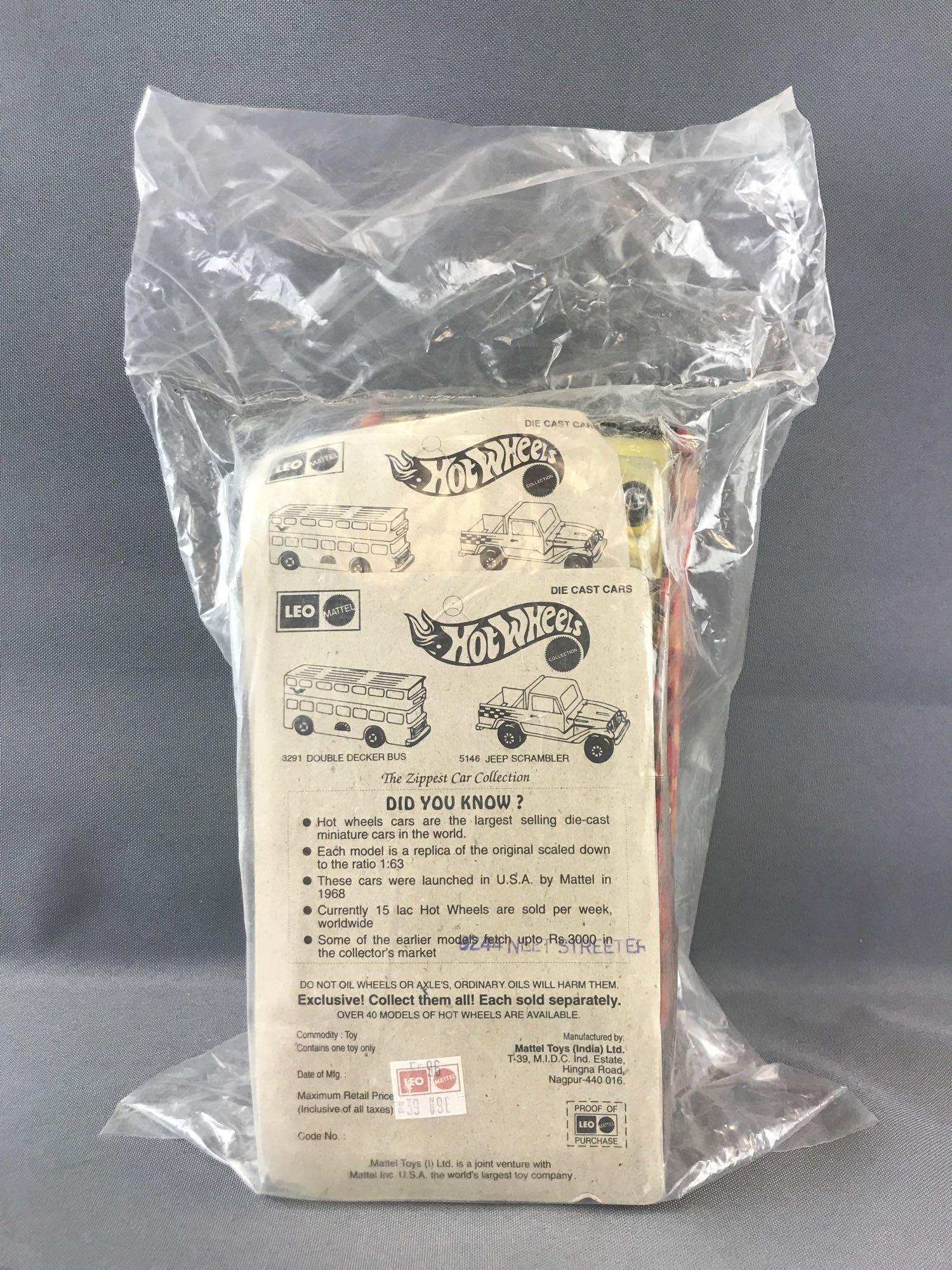 Sealed Shipping Bag of 8 Leo Mattel Neet Streeter Die: Yellow body, MOC