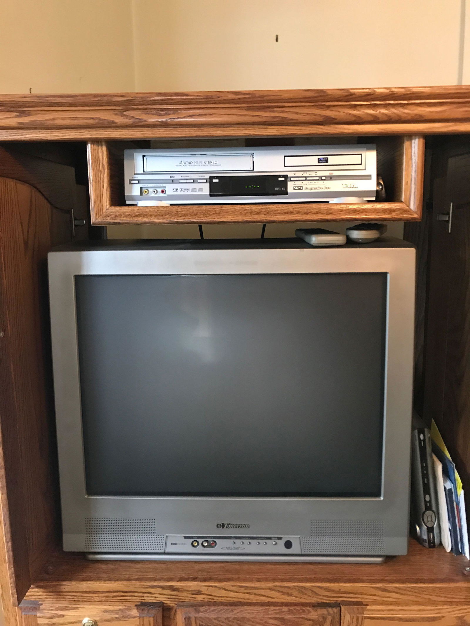 Emerson Television and "Tevion" VCR/ DVD Player: 28 inch TV. untested.Shipping is not available for this lot. Pick up only. (Large or heavy items can be transferred to our Gallery for an additional fee.)