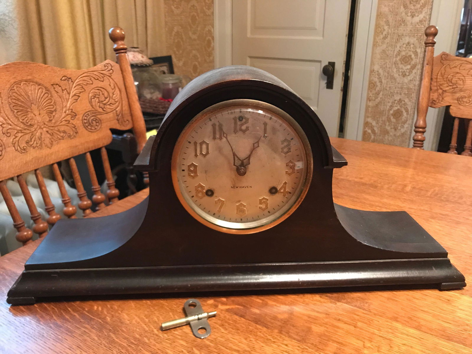 Antique New Haven Mantle Clock: With key; 19 3/4 x 5 x 9 1/2 inches. untested.