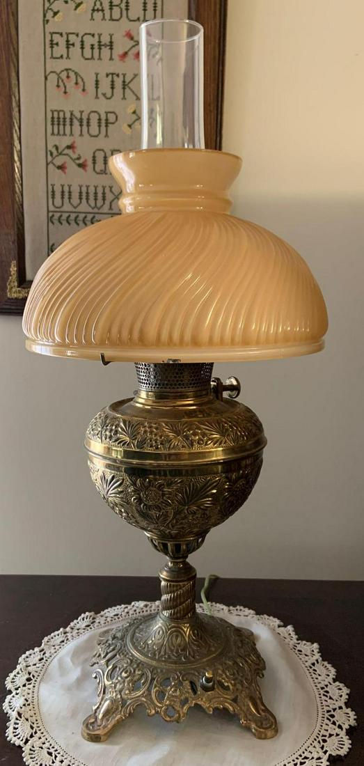 Antique Brass Electrified Oil Lamp w/ Glass Shade: 10 x 22 inches. Some chips on inside edge of shade