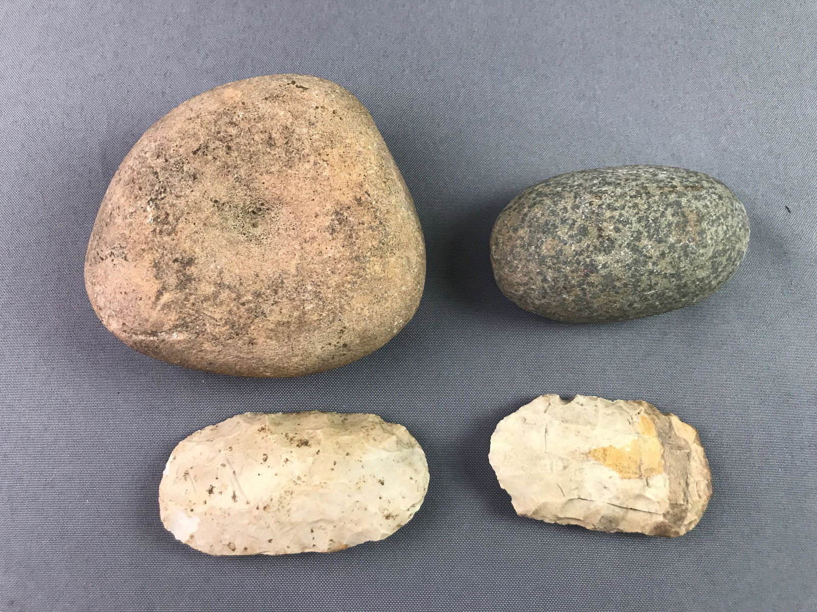 Group of 4 Native American Indian Artifacts-Stone Tools: Fire starter, grinder, and scrapers. Largest is 4 1/2 x 1 3/4 x 3 1/2 inches