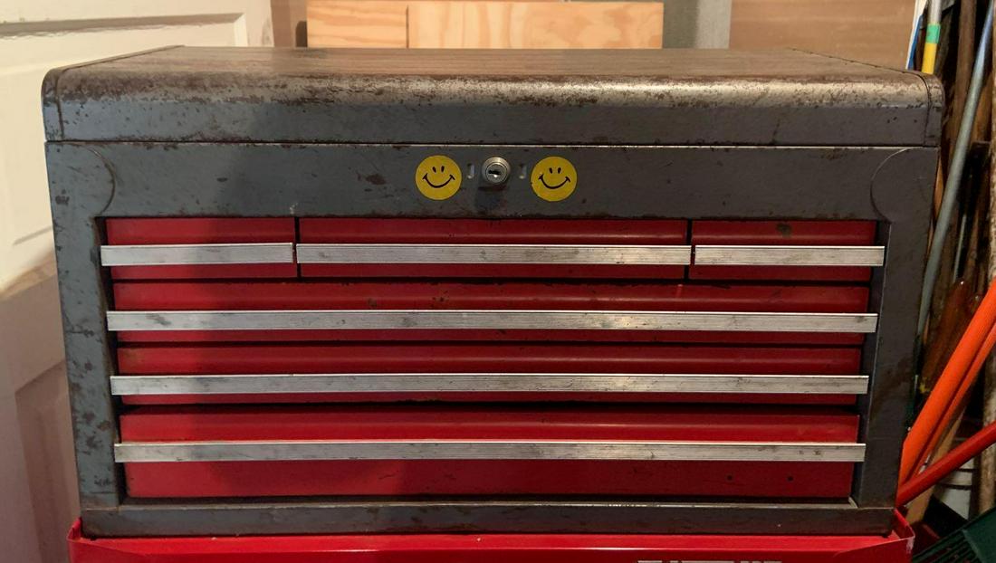 Grey and Red Tool Chest: 26 x 12 x 15 inches.Shipping is not available for this lot. Pick up only. (Large or heavy items can be transferred to our Gallery for an additional fee.)