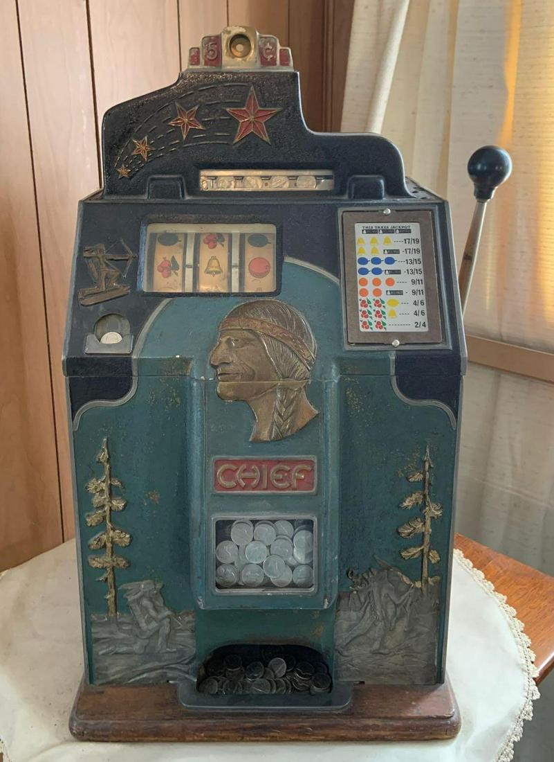Antique O.D. Jennings and Co. "Chief" Nickel Slot: 17 x 15 x 26 inches; working condition and seems to be set on free play. Includes parts, catalog and service manual.Shipping is not available for this lot. Pick up only. (Large or heavy items can be t