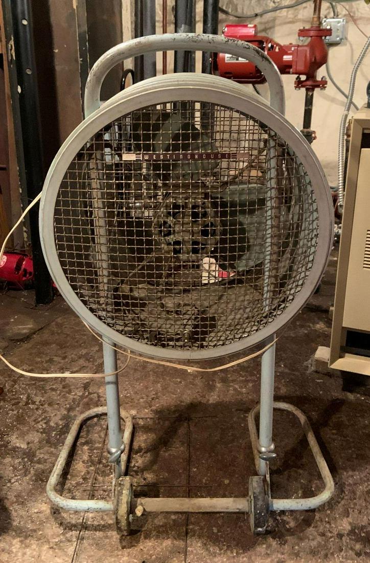 Vintage Westinghouse Industrial Floor Fan: 20 x 36 inches; working condition.Shipping is not available for this lot. Pick up only. (Large or heavy items can be transferred to our Gallery for an additional fee.)