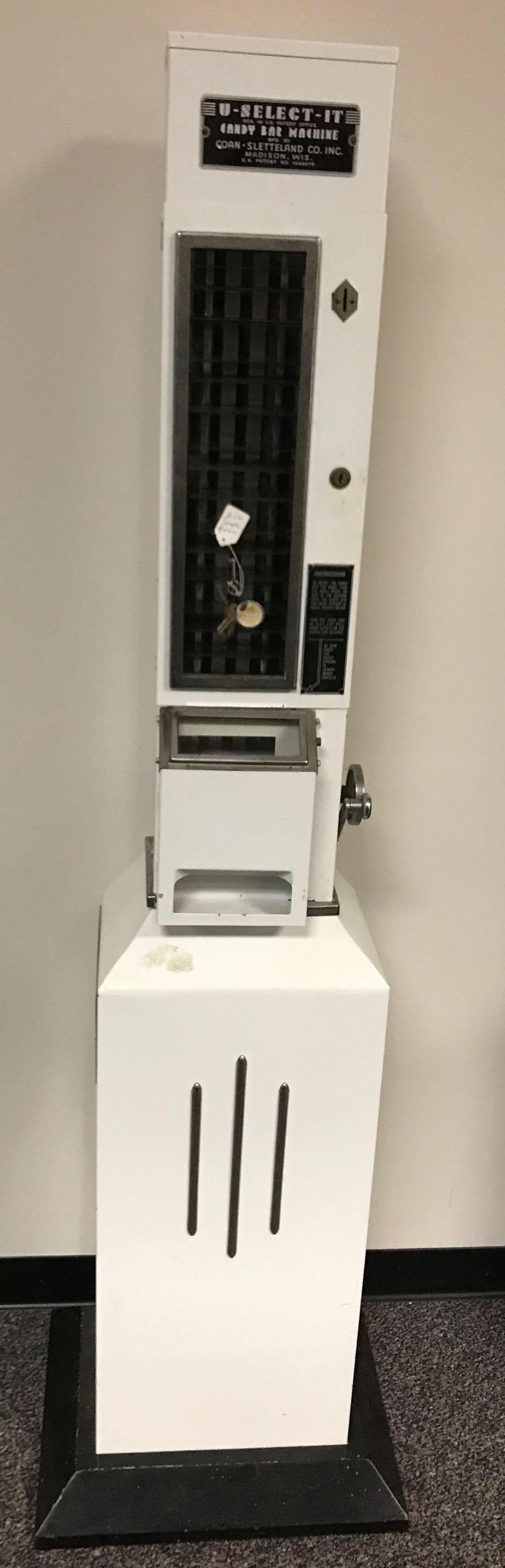 Vintage U Select It candy bar vending machine: Has keys, 70 inches tall. Untested. Handles work. No shipping available.