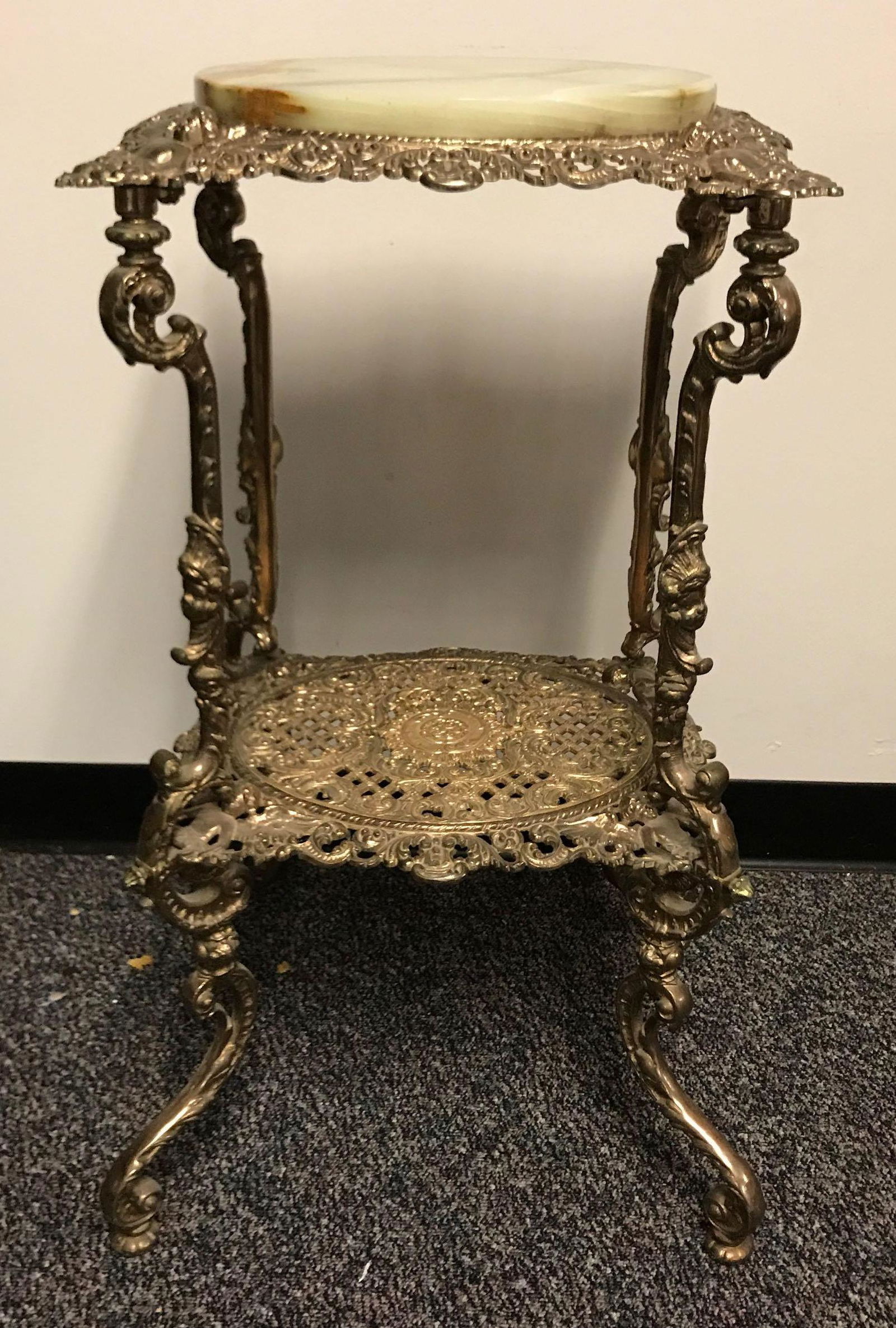 Antique brass and granite stand: 30 inches tall. No shipping.