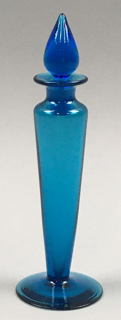 Carder Steuben Celeste Blue Cologne #1414 w/ Stopper: Frederick Carder's design #1414 shape was popular in blue and gold aurene finishes and "Verre de Soie" techniques, but it was not produced as frequently in clear crystal colors. This Steuben Celeste B